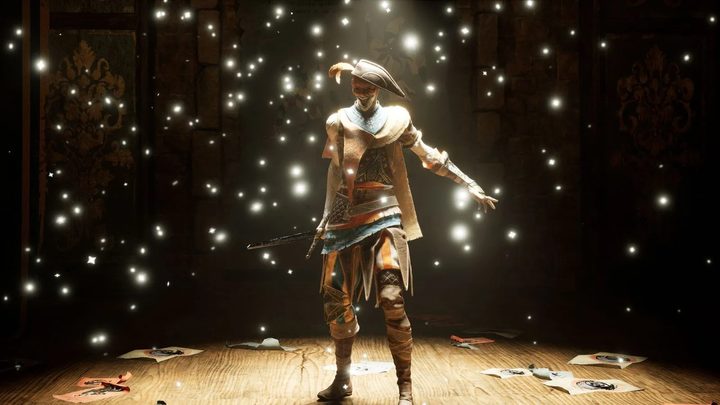 A man in a mask and a three-pointed hat standing in a spotlight.