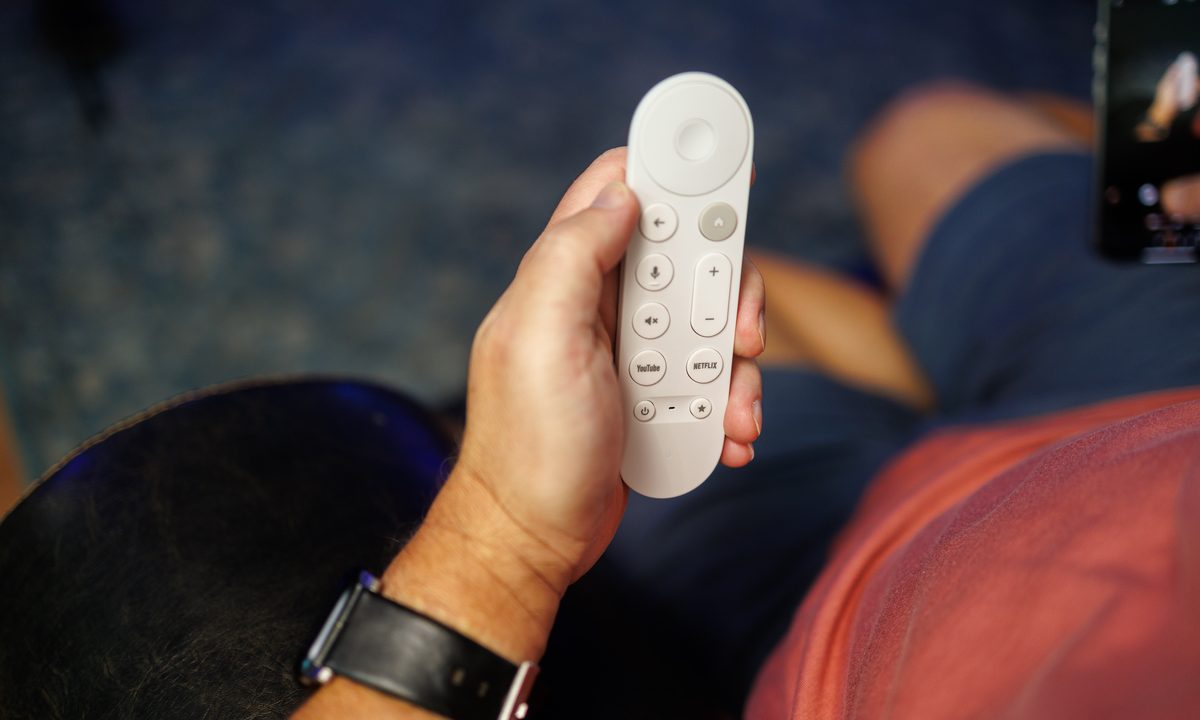 The Google TV Streamer remote control in a very good-looking hand.