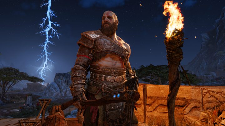 Kratos standing in front of a lightning bolt.