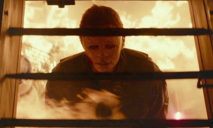 Michael Myers looks up as fire consumes him in Halloween.