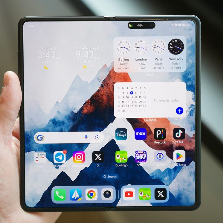 The Honor Magic V3 open in someone's hand.