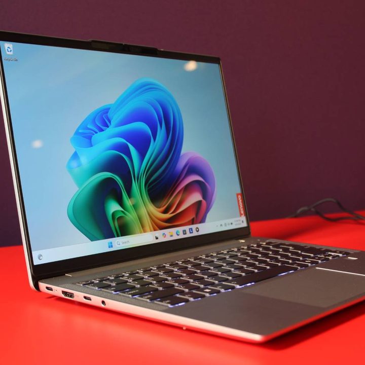 The IdeaPad 5x on a red table.