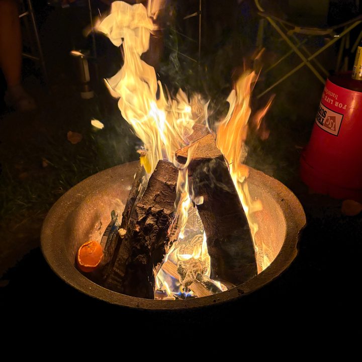 A photo of a campfire at night, taken with the iPhone 16.