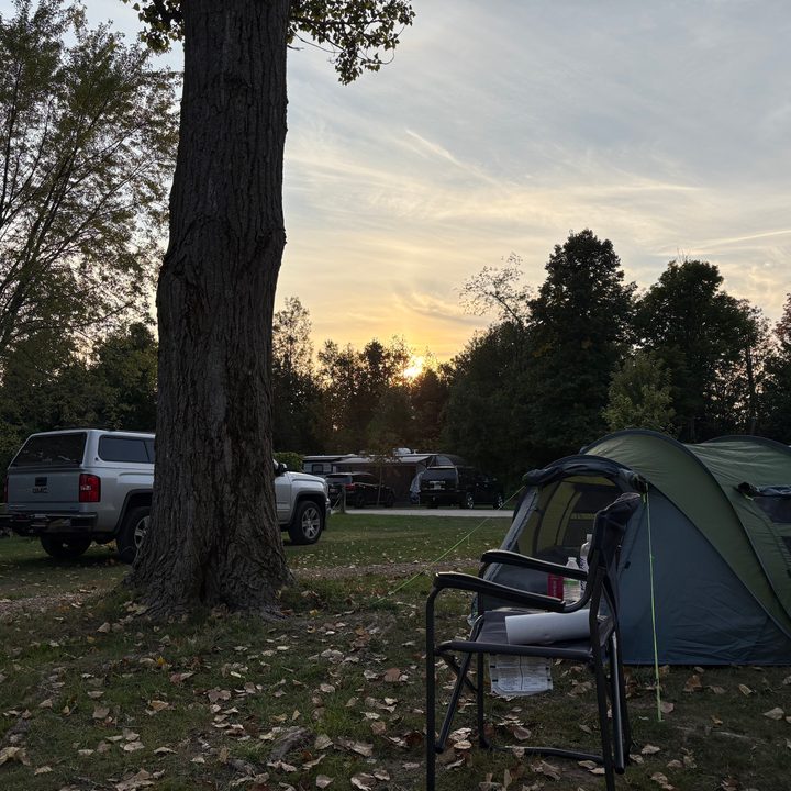 A photo of a campsite during sunset, taken with the iPhone 16.
