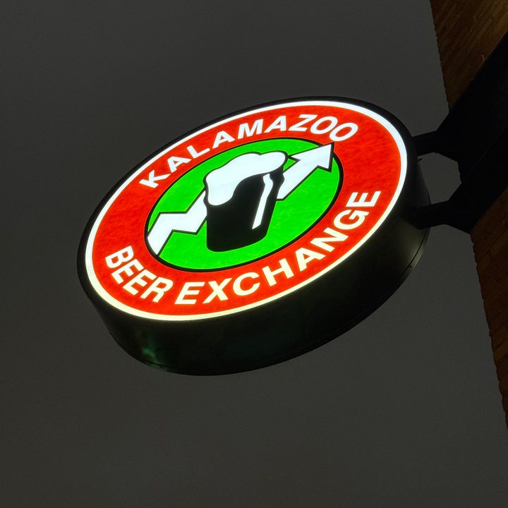 A photo of a sign at night that says "Kalamazoo Beer Exchange," taken with the iPhone 16 Pro.