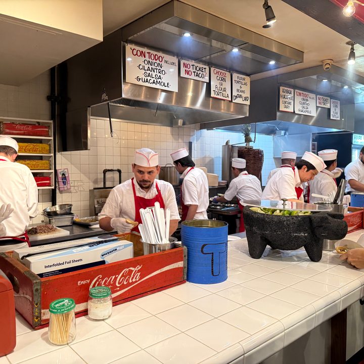A photo of the kitchen of a taco restaurant, taken with the iPhone 16 Pro.