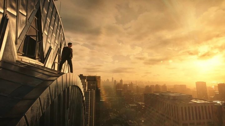 A man looks out at a city in Megalopolis.