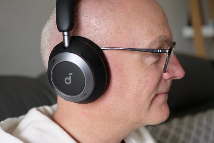 A person wearing the Soundcore Space One Pro headphones.
