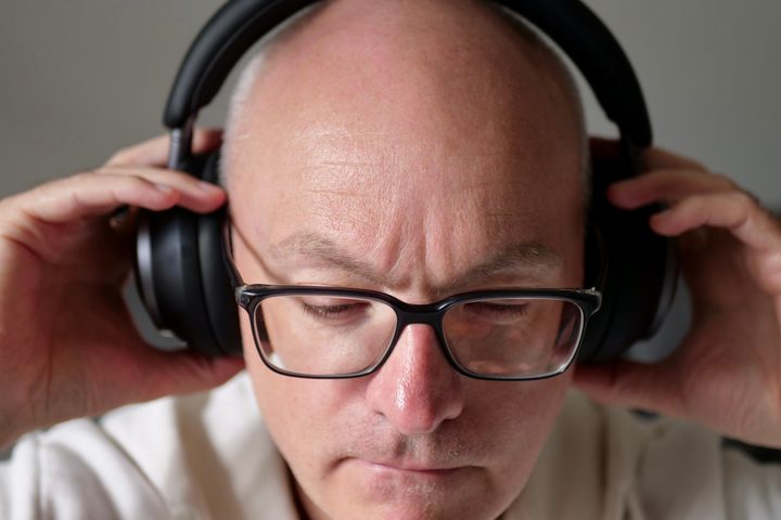 A person wearing the Soundcore Space One Pro headphones.