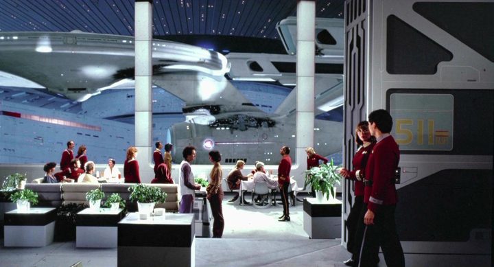 The Enterprise returns to space dock after the events of Star Trek II.