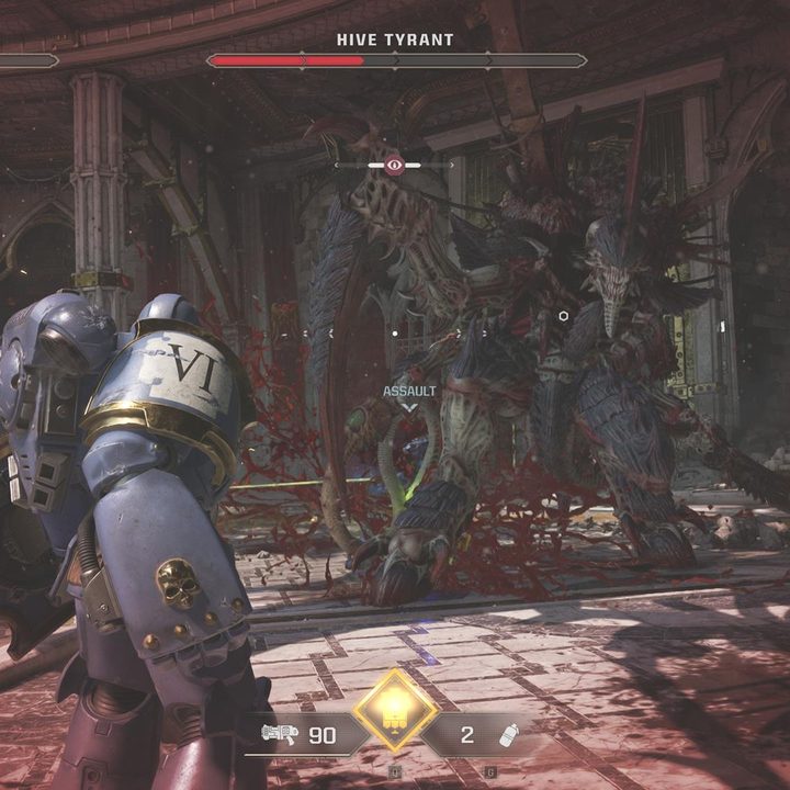 The image shows the player looking at the Hive Tyrant.