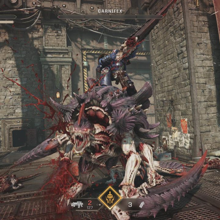 A player finishes off a Carnifex monster in Warhammer 40,000: Space Marine 2.