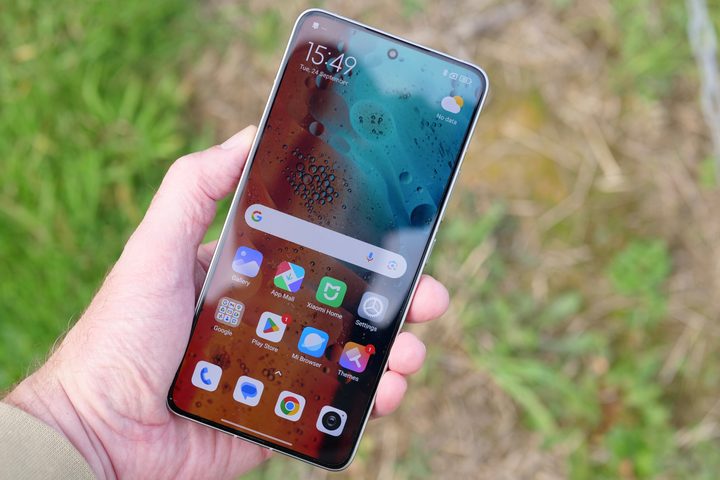 A person holding the Xiaomi 14T Pro.