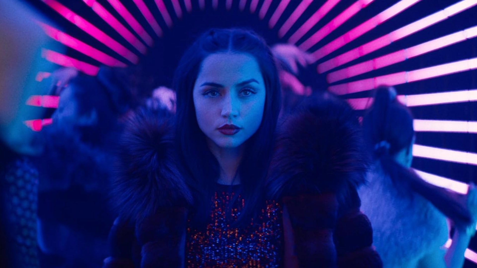 Ana de Armas walks in a brightly lit room in "From the World of John Wick: Ballerina."
