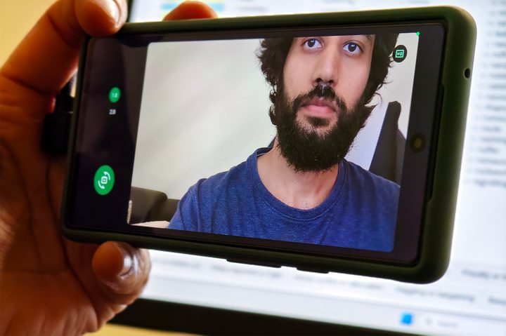 HQ webcam mode on Android 15 running on a Google Pixel 6a held in hand.