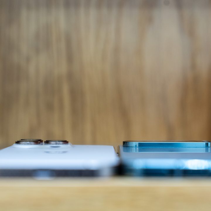 Photo of the camera bump on the iPhone 16 Pro and Pixel 9 Pro laying flat