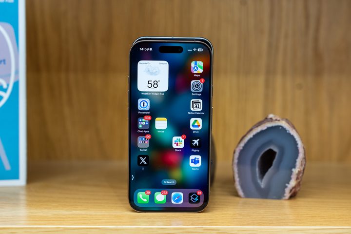 The iPhone 16 Pro in front of the Pixel 9 Pro showing the small differences in height and width.