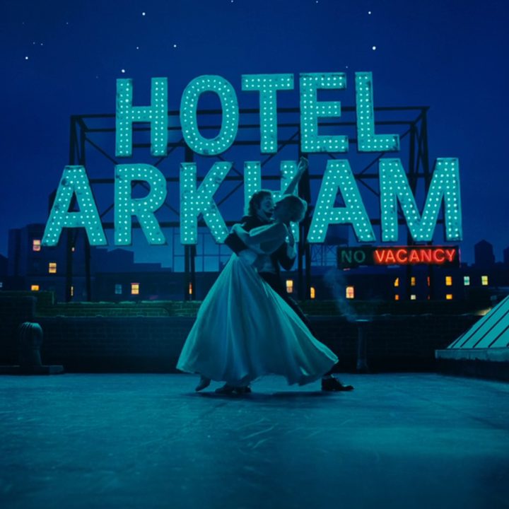 Arthur and Lee dance on a fake rooftop in "Joker: Folie à Deux."