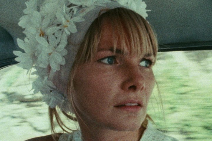 Barbara Loden sits in a speeding car in Wanda.