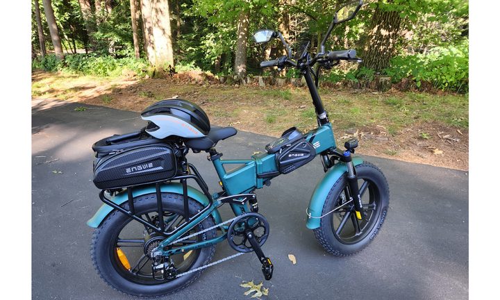 Engwe Engine Pro 2.0 folding bike with optional rack bag, frame bag, mirrors, and helmet.