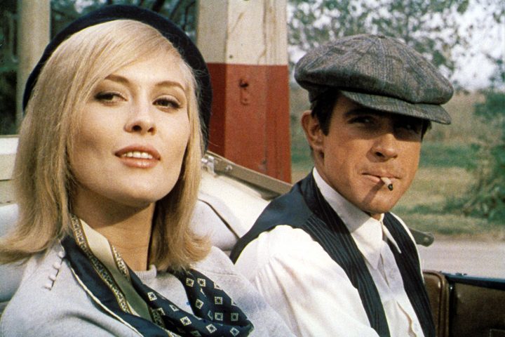 Faye Dunaway and Warren Beatty sit in a car together in Bonnie and Clyde.