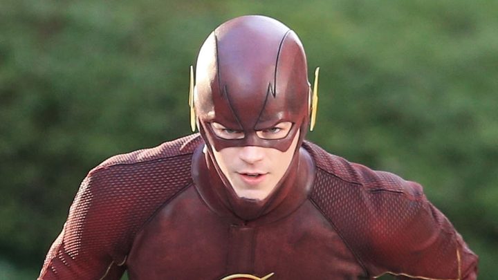 Grant Gustin as The Flash looking ahead and getting ready to run in The Flash.