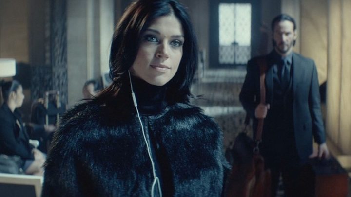 Adrianne Palicki and Keanu Reeves in John Wick.