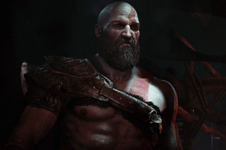 Kratos stands in a cabin in God of War.