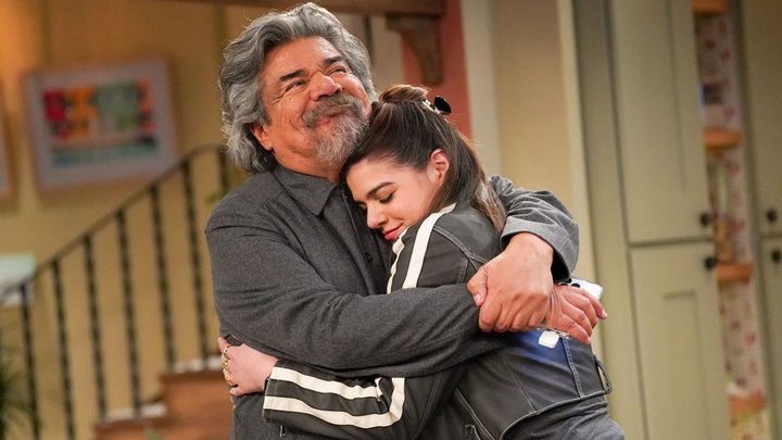 George Lopez hugs Mayan Lopez in Lopez vs. Lopez.