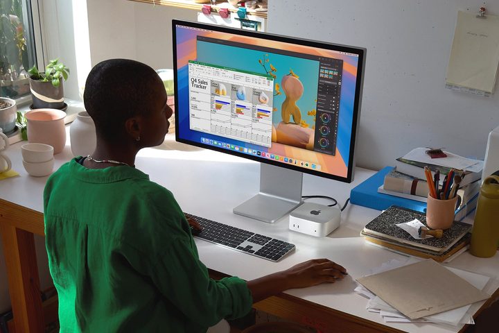 The M4 Mac mini being used in a workplace.