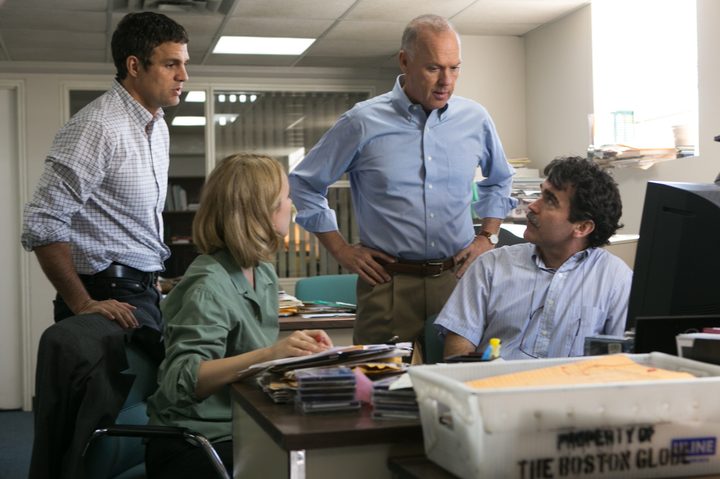 Michael Keaton stands in a newsroom office in Spotlight.
