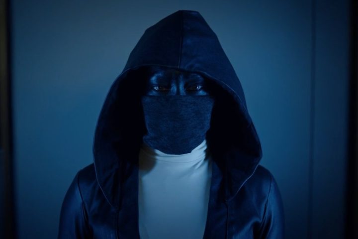 Regina King dons her Sister Night costume in Watchmen.
