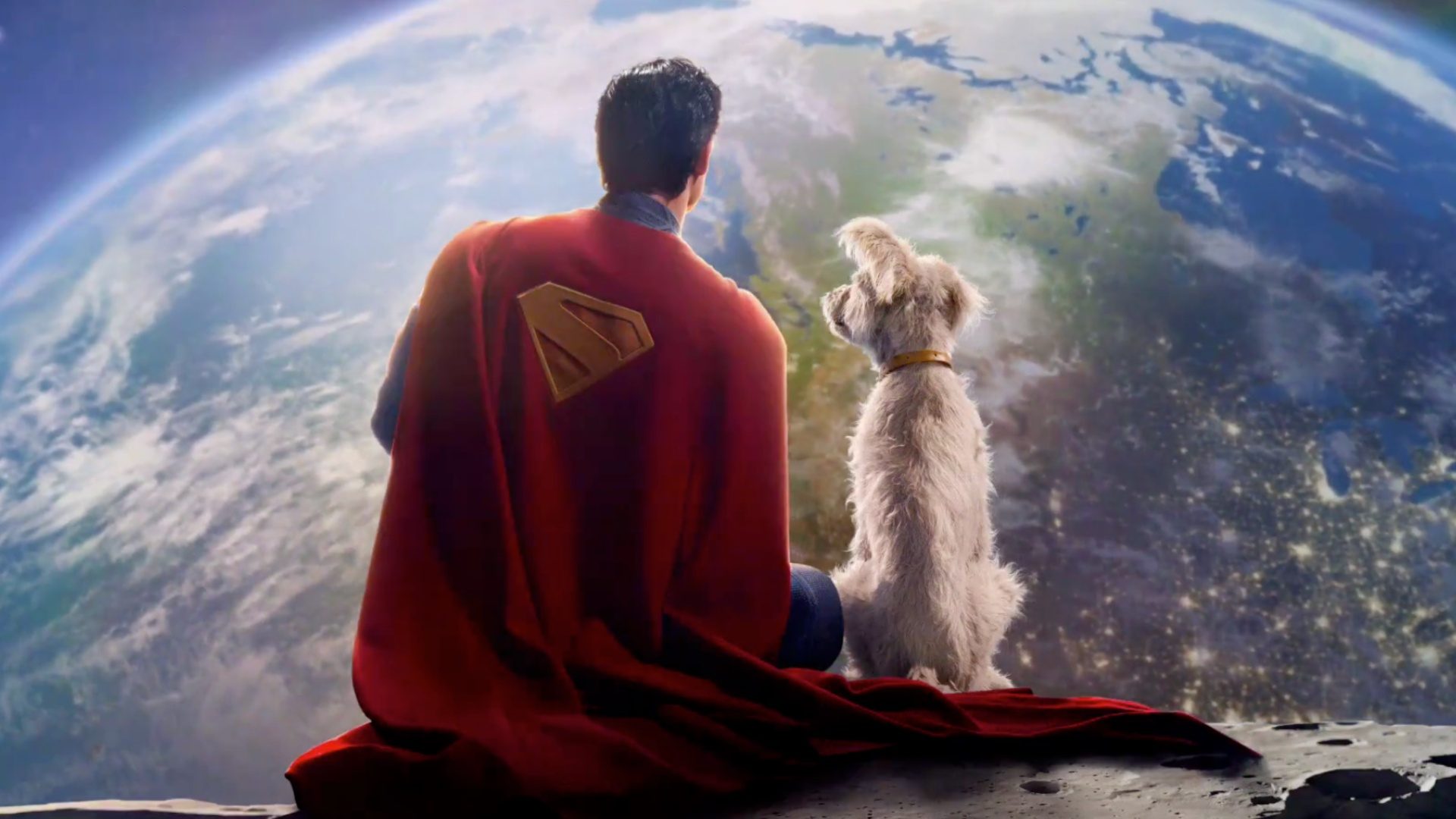 Superman and his dog look at Earth from space.