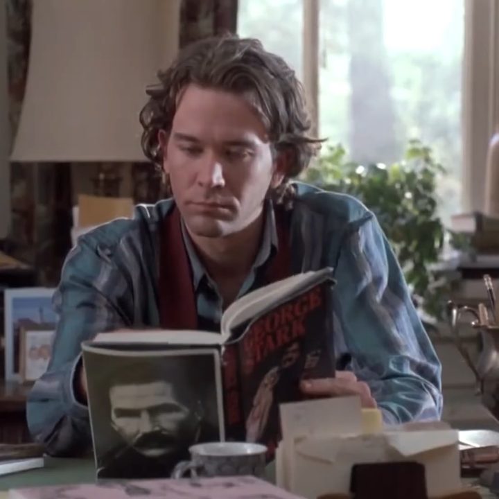 Timothy Hutton reading a book in "The Dark Half."