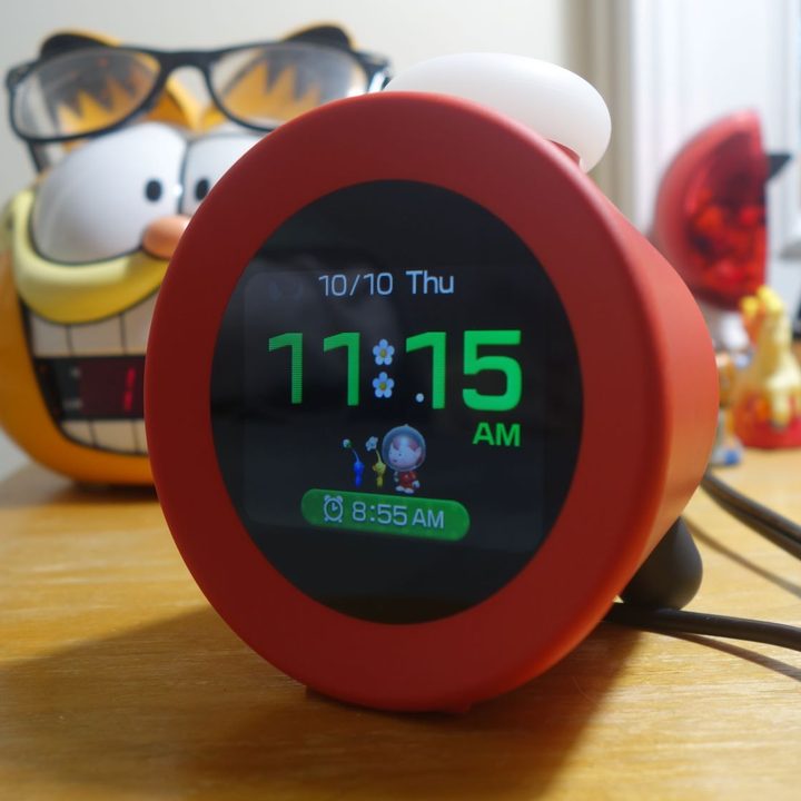 The Alarmo sits on a nightstand.