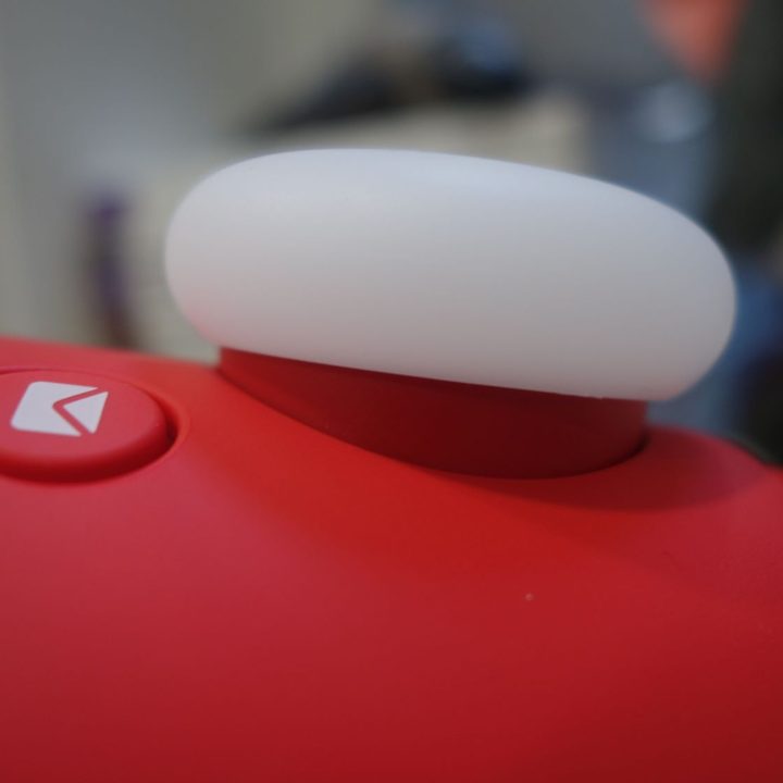 The top knob of the Alarmo is shown close up.