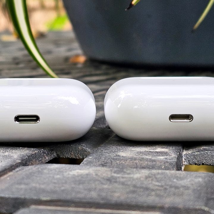 Apple AirPods 4 and AirPods 3 charging cases side by side.