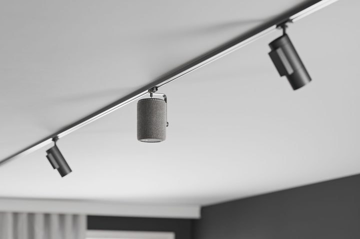 Audio Pro A10 MK II Wiim Edition wireless speaker, mounted to a ceiling track.
