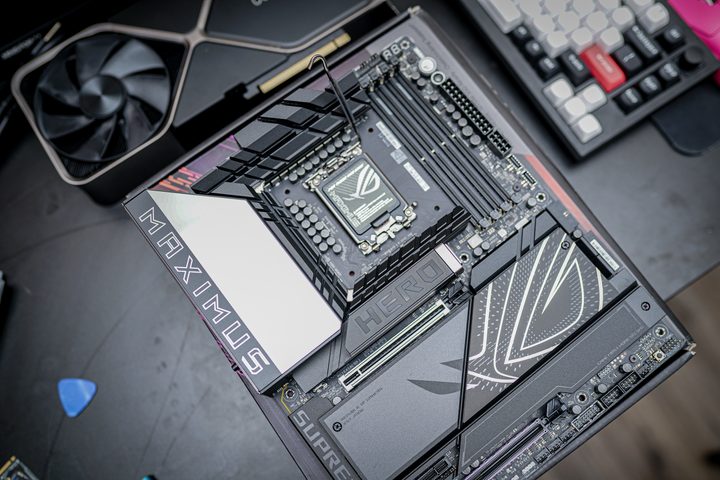 The Asus ROG Maximus Hero Z890 motherboard sitting on a table.
