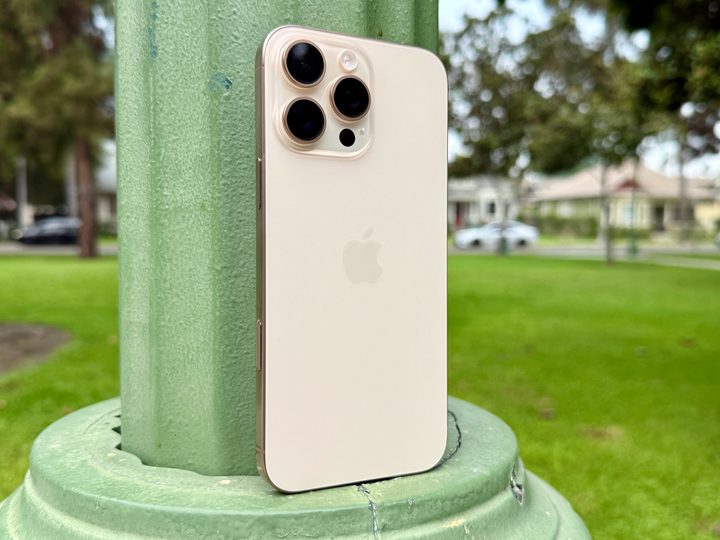iPhone 16 Pro Max in Desert Titanium.