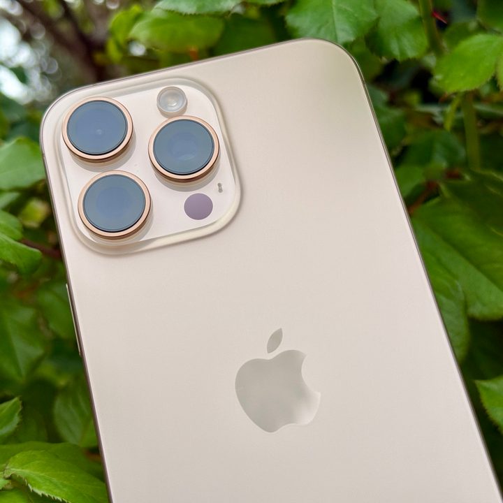 iPhone 16 Pro Max in Desert Titanium.
