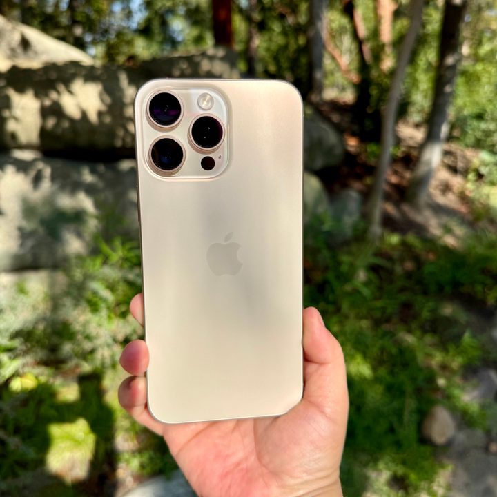 iPhone 16 Pro Max in Desert Titanium.