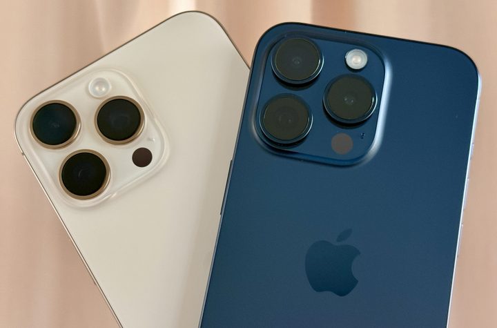Natural Titanium iPhone 16 Pro Max (left) and a Blue Titanium iPhone 15 Pro.
