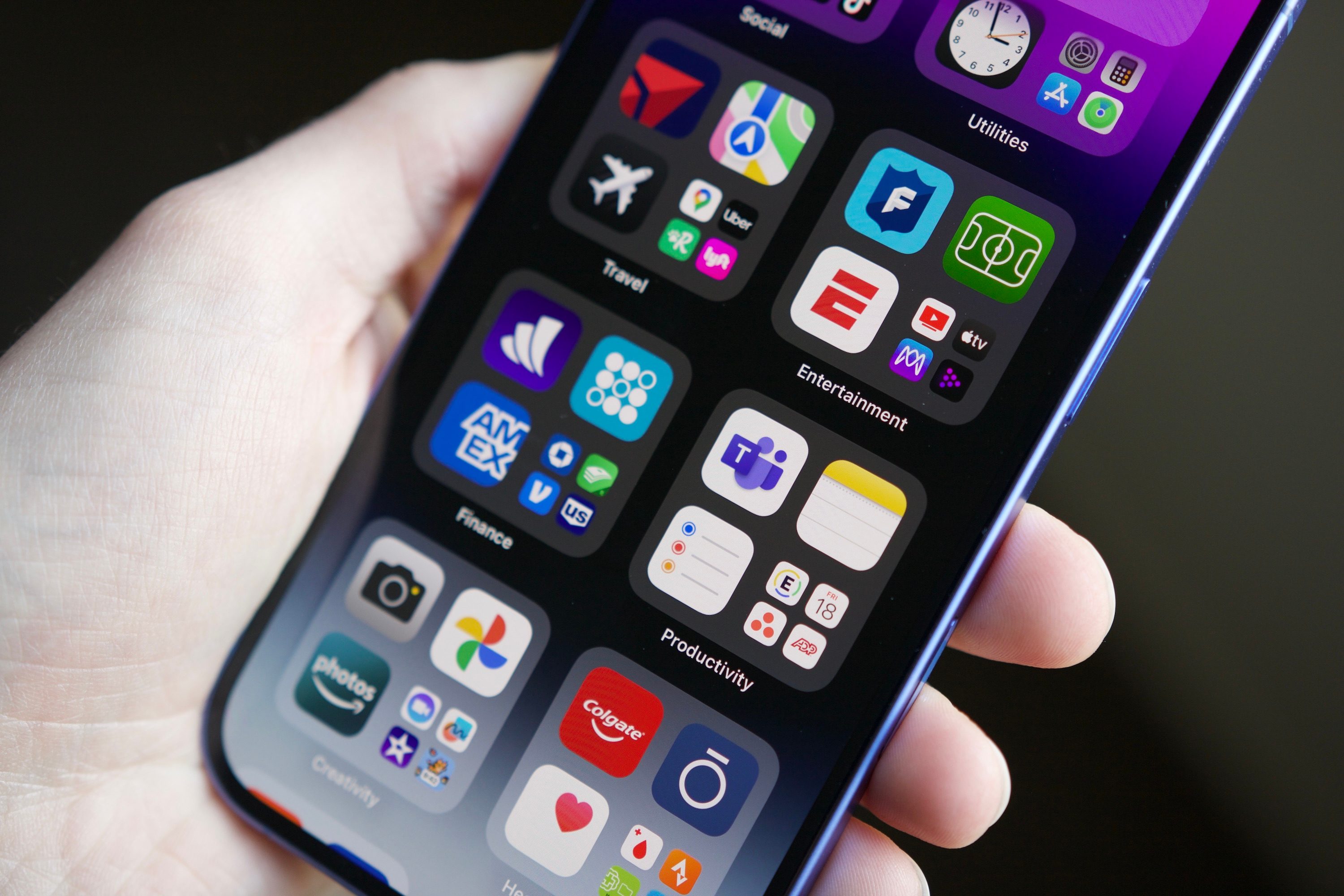 A close-up view of the App Library page on the iPhone 16.