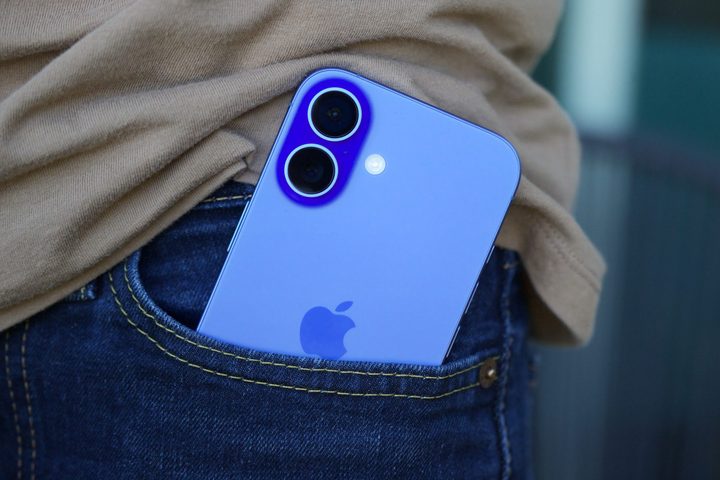 The iPhone 16 sticking out of someone's pocket.