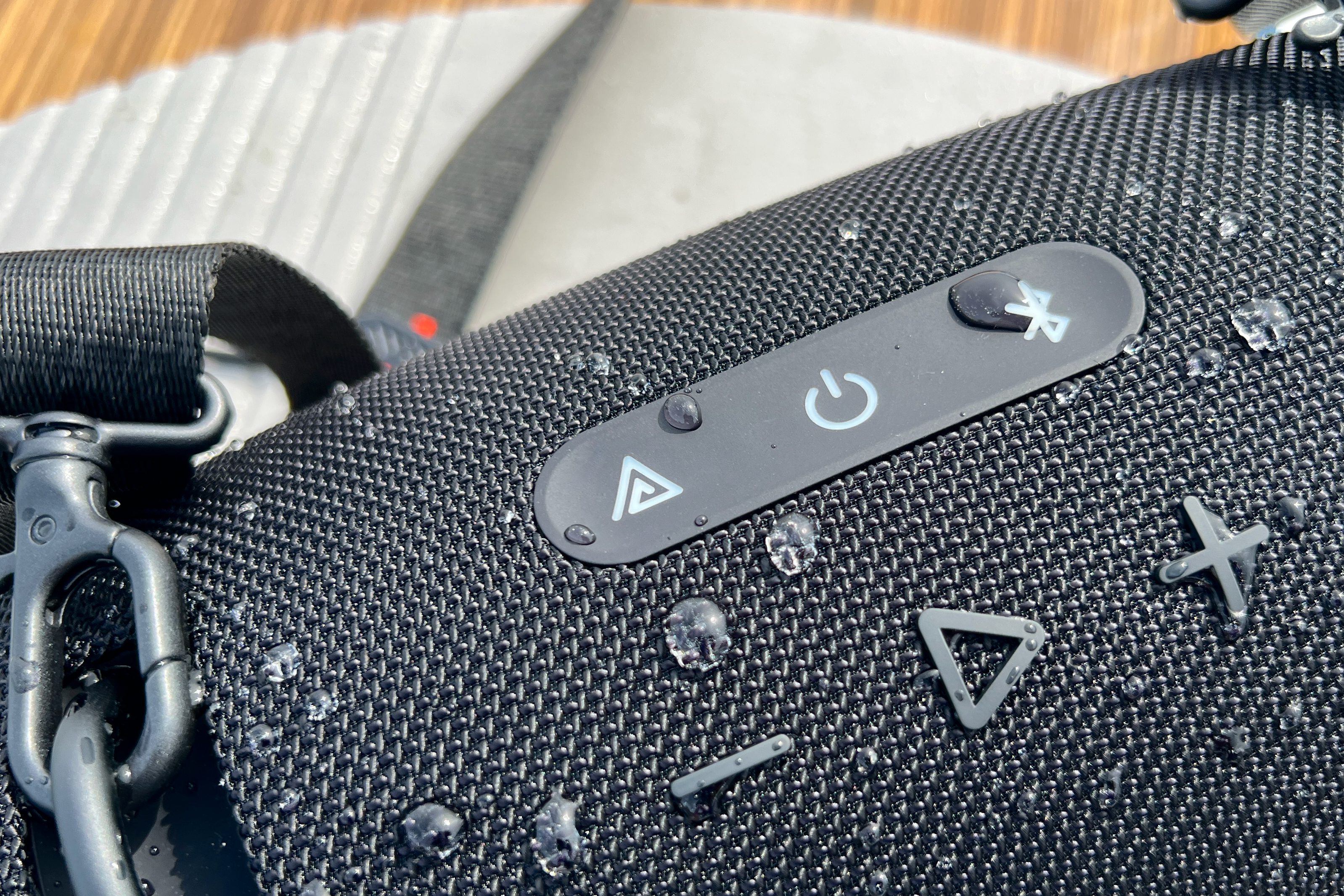 A JBL Xtreme 4 speaker with a dedicated Auracast button.
