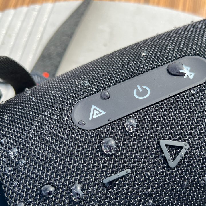 A JBL Xtreme 4 speaker with a dedicated Auracast button.