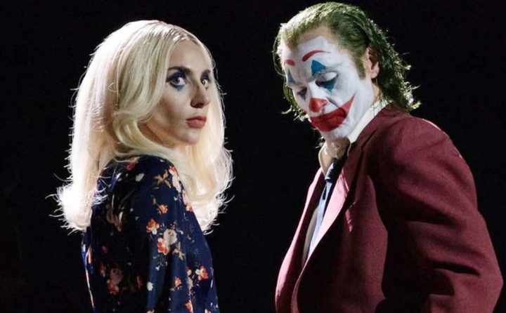 Joker and Harley look at something in Joker: Folie a Deux.