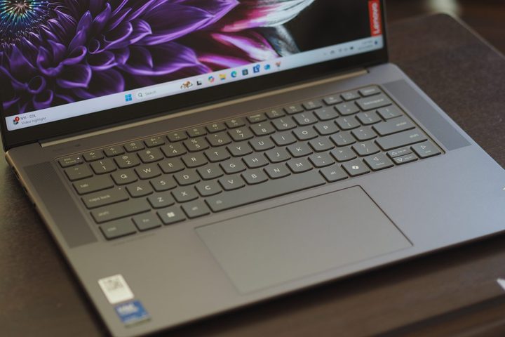 Lenovo Yoga Slim 7i Aura Edition top down view showing keyboard and touchpad.