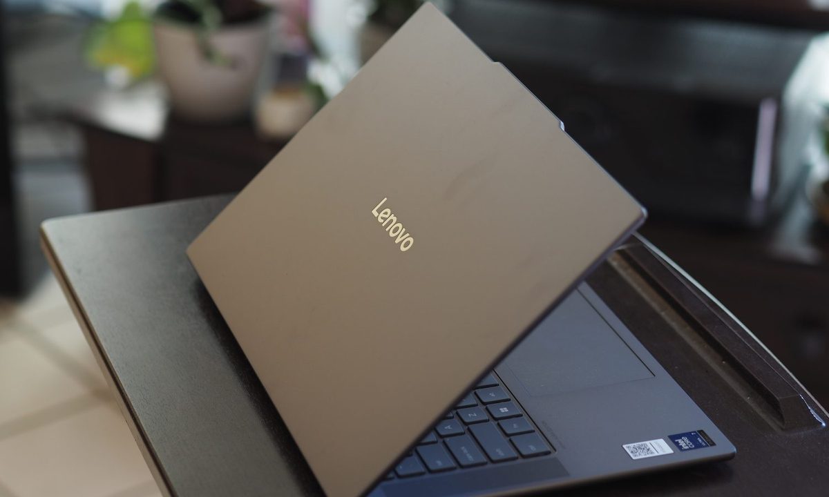 Lenovo Yoga Slim 7i Aura Edition rear view showing lid and logo.